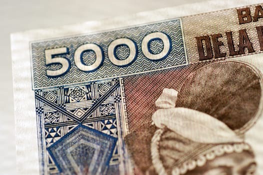Corner of one 5000 bank note, close-up