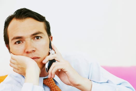 Portrait of a businessman using a mobile phone