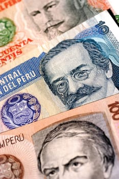 Close-up of men on bank notes
