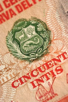 Extreme close-up of symbol and text on bank note