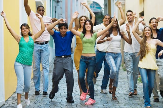 Portrait of a group of friends walking on the street