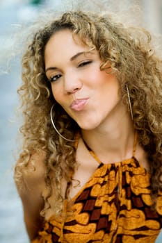 Portrait of a teenage girl puckering her lips