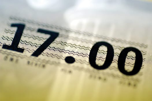 Check for seventeen units of money, close-up