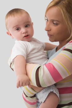 Close_up of a mid adult woman looking at her son and smiling