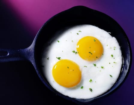 Close-up of eggs frying in a pan