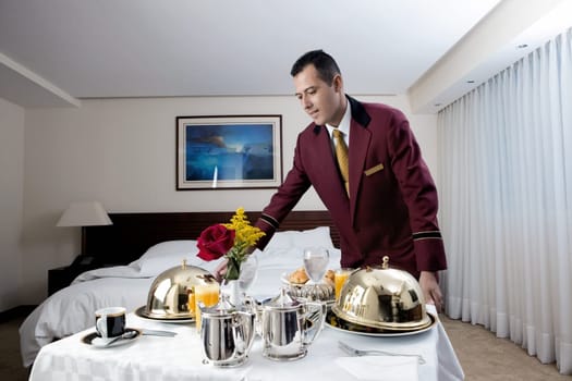 Waiter serving food
