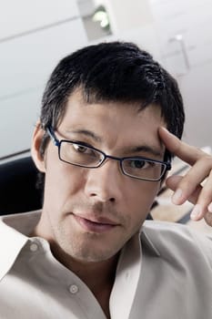 Portrait of a businessman thinking