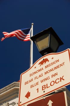 Close-up of a sign board on a lamppost, California, USA