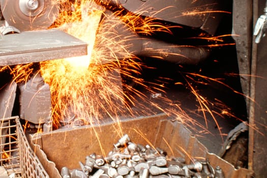 Close-up of a circular saw cutting a metal piece, Wisconsin, USA