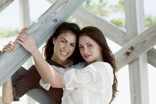 Portrait of two young women smiling