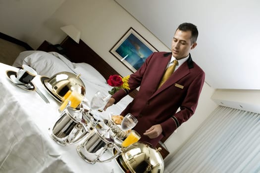 Waiter serving food