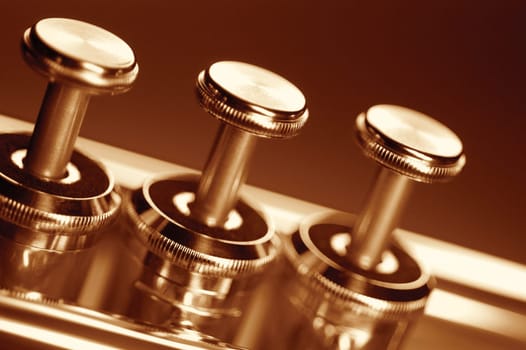 Extreme close-up of trumpet keys