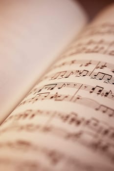 Close-up of sheet music in book