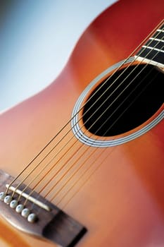 Close-up of guitar, its strings and frets
