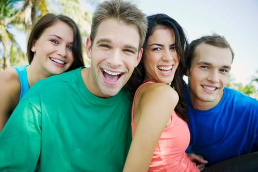 Portrait of two young couples smiling