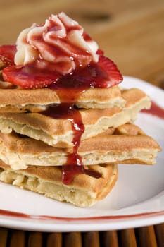 Close-up of a strawberry waffle in a plate