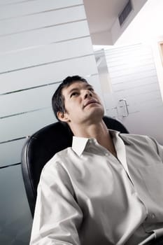 Close-up of a businessman thinking