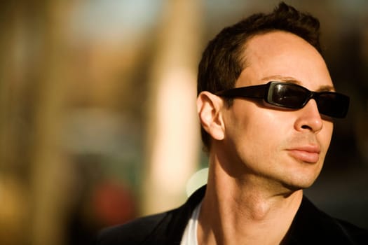 Close-up of a young man wearing sunglasses