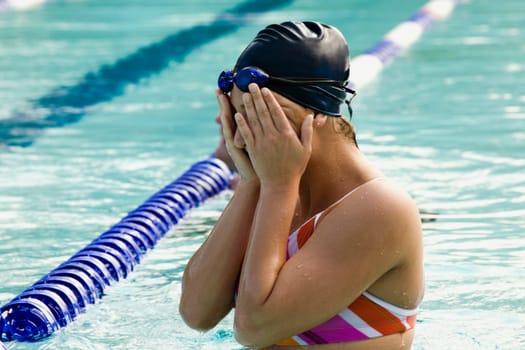 Close-up of a young woman in a swimming pool