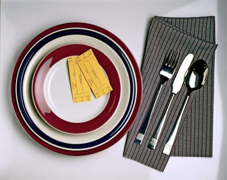 High angle view of two admission tickets on a plate