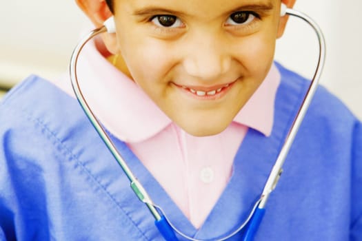 Portrait of a boy imitating a doctor