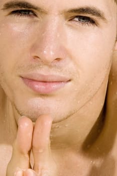 Portrait of a young man squinting