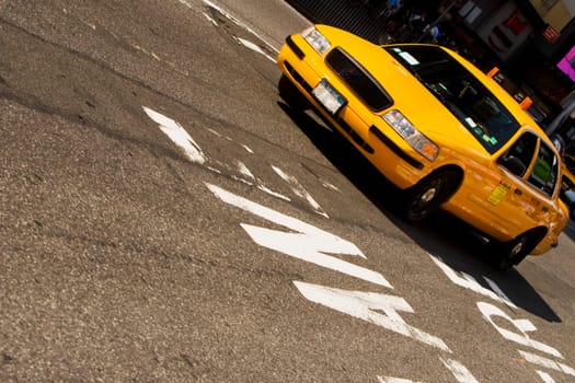 Close-up of a taxi on the road, New York City, New York State, USA