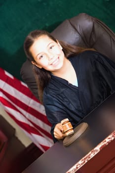 Portrait of a girl pretending to be a judge