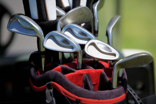 Close-up of golf clubs in a golf bag