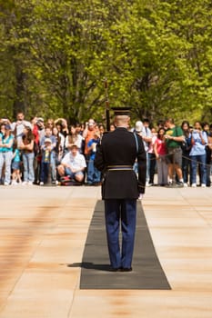 Tourist looking at an honor guard