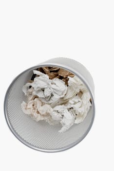 High angle view of crumpled paper in a wastepaper basket
