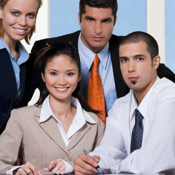 Portrait of two businesswomen and two businessmen in an office