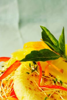 Close-up of herbs and cheese on bread
