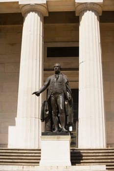 Statue in front of a building