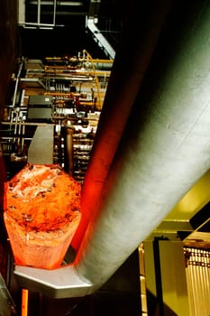 Hot steel coming out of a rotary furnace