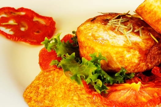 Close-up of roast meat and lettuce