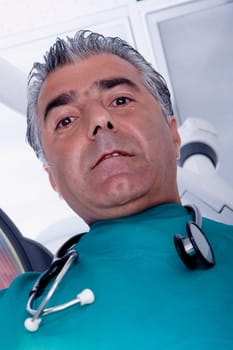 Portrait of a male surgeon with a stethoscope around his neck