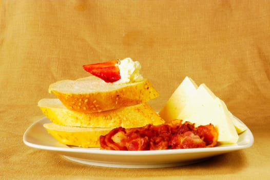 Close-up of slices of bread and cheese on a plate
