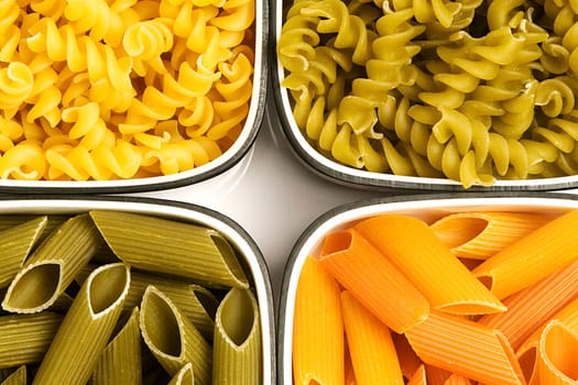 Close_up of raw pasta in bowls
