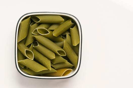 Close_up of penne pasta in a bowl
