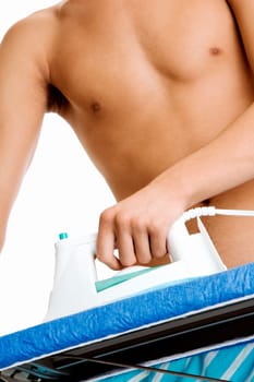 Close-up of a man ironing