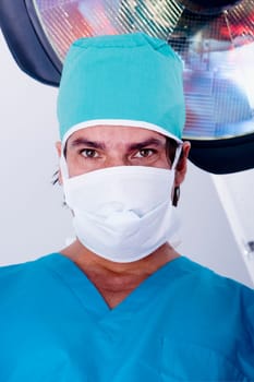 Portrait of a male surgeon wearing a surgical mask