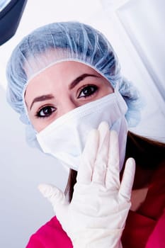 Portrait of a female surgeon wearing scrubs