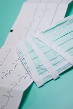 Close_up of an electrocardiogram report with a bandage