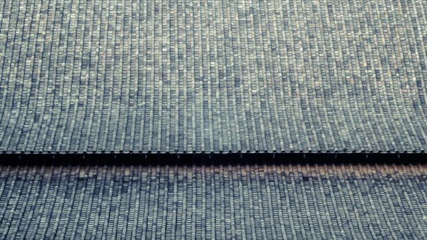 The Chinese Roof Tiles with Curve Design. The clay roof of a Japanese temple. material of traditional Asian architecture pattern texture background