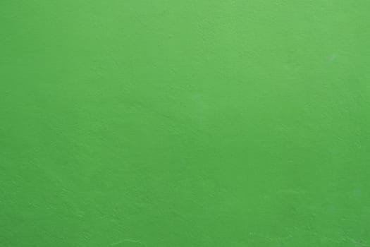 Painted Christmas color rusty plaster texture wall for background. Texture material in architecture and interior surface.