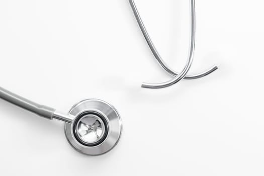 Stethoscope for doctor checkup in health medical laboratory table as medical concept