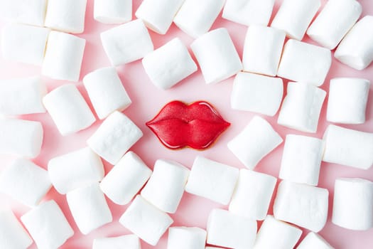 Gingerbread cookies lips with white marshmallow. Valentine card. Pink background. High quality photo