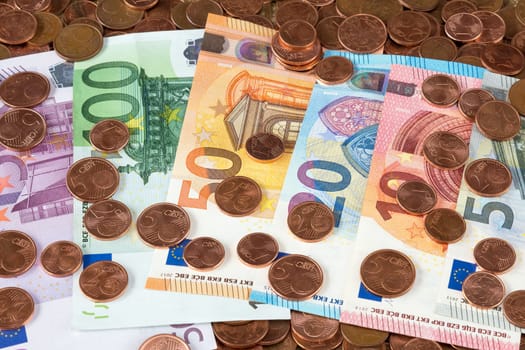 Various Euro banknotes with Euro cents,view from above
