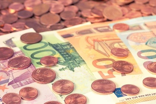 Various Euro banknotes with Euro cents, filtered image